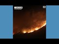 Wildfire burns near California coast - Video