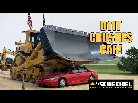 CAT D11T Dozer Crushes Car!