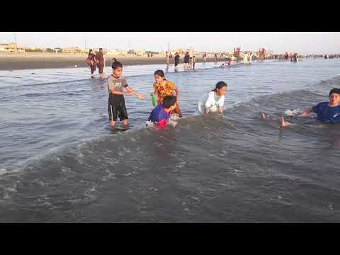 Aun, Hamza, Asad, Laila and Zeest on beach