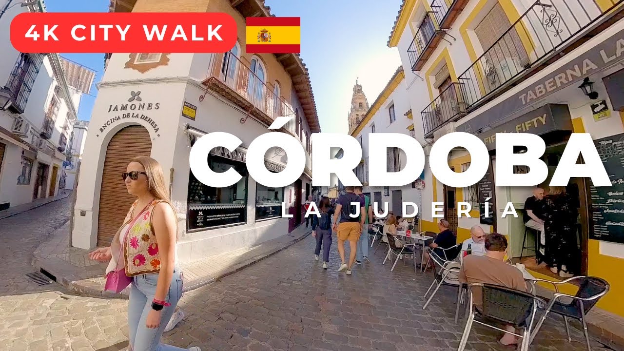 Immersive street-level walking tour through Cordoba Juderia, Spain, showcasing authentic urban landscapes, local architecture, and the vibrant atmosphere of the city's neighborhoods