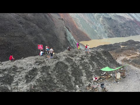 Mass burial for scores killed in Myanmar jade mine disaster | AFP