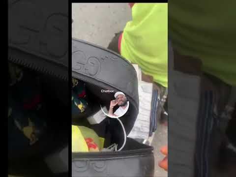 Police officer challenges citizen over recording during bag search
