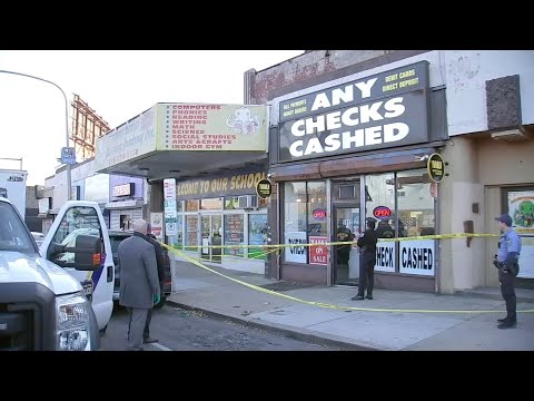 GUNMAN WANTED: Owner of check cashing business shot and killed during apparent robbery