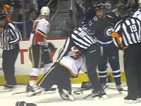 Winnipeg Jet, Dustin Byfuglien, takes on two Flames