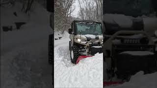 Can Am Vs Tractor Plowing Snow
