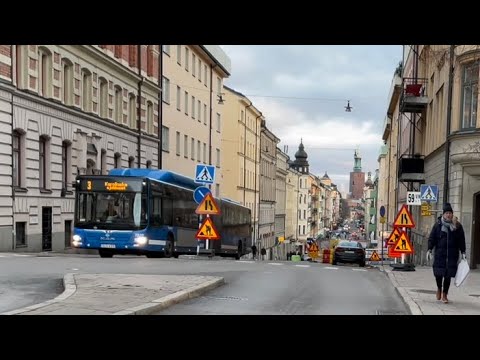 Swedish street life: walking in Stockholm city. Hantverkargatan to the Nobel Prize Venue at Sunset.