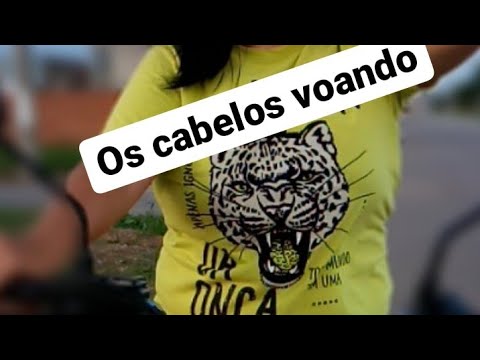 minha mãe aprendendo anda de moto -com muito medo kkkk