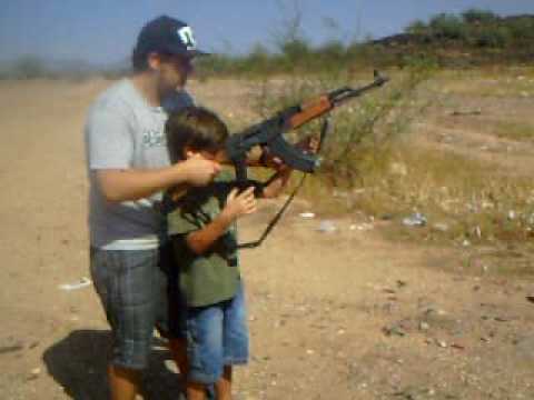 my little brother shooting an ak47
