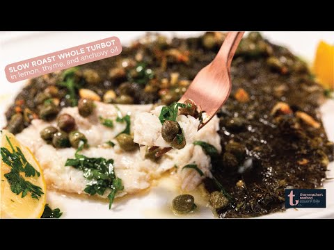SLOW ROAST WHOLE TURBOT IN LEMON, THYME, AND ANCHOVY OIL เมนูปลาเทอบอตอบสมุนไพร