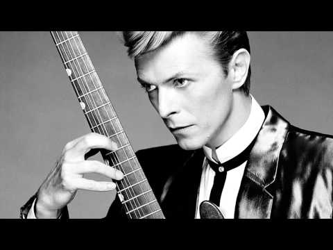 Boy performed by David Bowie and Attack Pop Culture References (2001 Song)