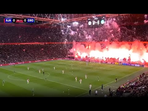 Moment fireworks force Ajax match abandonment in Amsterdam