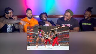 The Usos and The New Day watch their Hell in a Cel