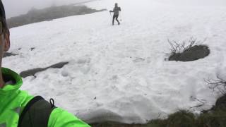 Watching my lady descend the remaining alpine snow on Granite Mountain