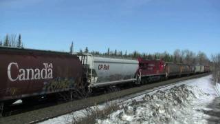 preview picture of video 'CP Stacks and grain hoppers south bound at Ardbeg on CN tracks March 18 2009'