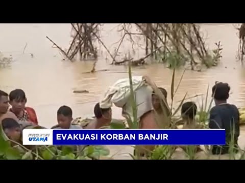 PERSONEL POLRES DELI SERDANG EVAKUASI KORBAN BANJIR