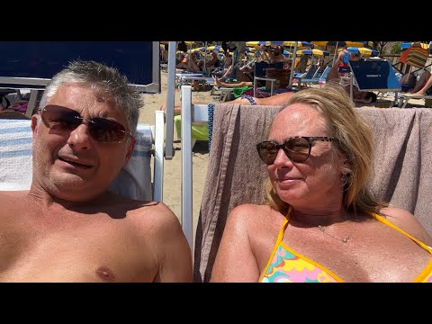Jokes Between Husband and Wife on the Beach - Paci