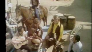 Tall dark stranger - Buck Owens