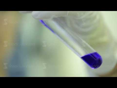 Test tubes closeup. Medical equipment. Close-up footage of a scientist using a micro pipette in a