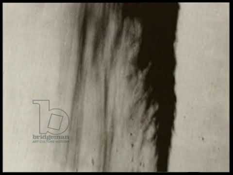 Texas Oil Boom, Spindletop, Lucas Gusher, drilling fields, car being refuelled at gas station. 1901