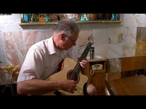 Classical Instructor trying my falcate braced steel string guitar