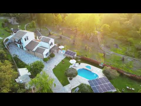 Private estate in Corfu with serene interiors