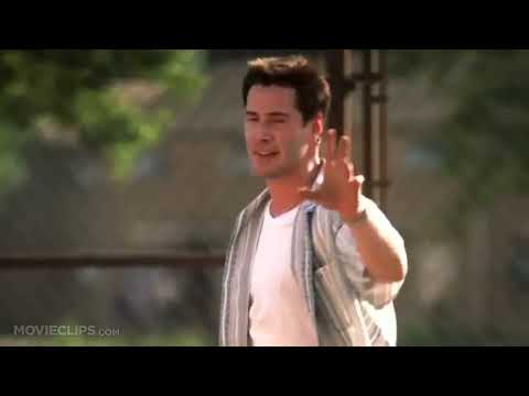 Trailer still of a tense mound visit—where a headphones cue becomes a character’s coping tool