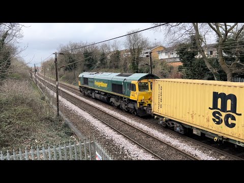 Freightliner 90042 and 90014 roar past St Dominics Road with 66532 on the rear working 4L95