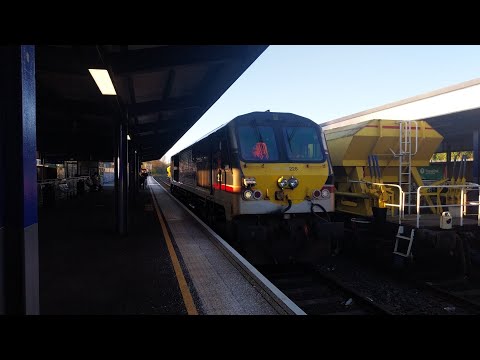 NIR 201 Class 228 running light through Ballymena platform 1.