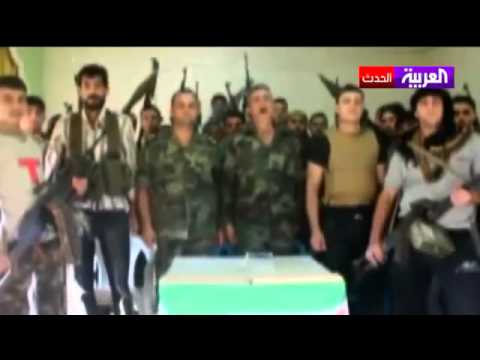 تقرير تلفزيوني حول تشكيل كيان الجيش الوطني السوري بقيادة اللواء محمد الحاج علي