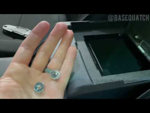 Installing the Ford x Console Vault center console safe.