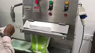 Semi automatic milk packing machine
