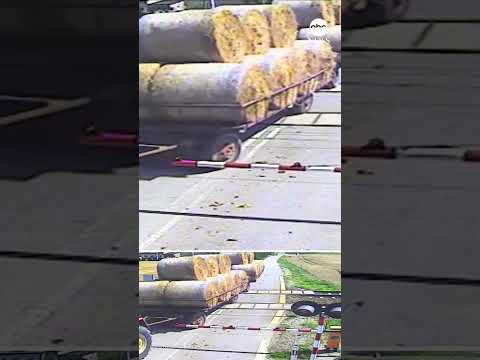 Train crashes through trailer as drunk driver stops on tracks