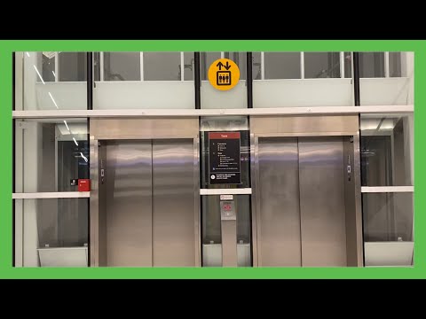 Schindler 5500 Traction Glass Elevators at Concourse N in Seatac INTL Airport