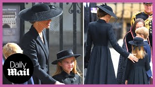 Cute moment Kate Middleton strokes hair of nervous Princess Charlotte