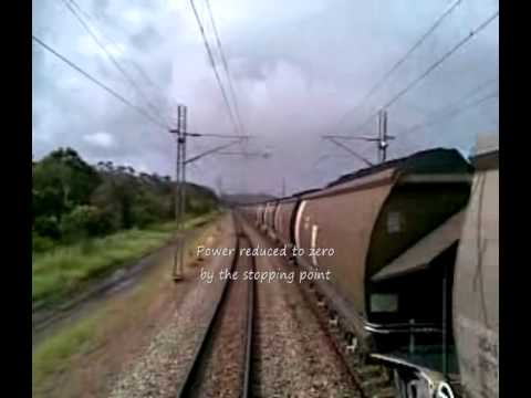 QR National coal train departing Jilalan in the Goonyella System (Queensland Australia 2010)