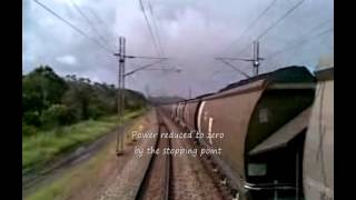 preview picture of video 'QR National coal train departing Jilalan in the Goonyella System (Queensland Australia 2010)'