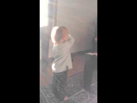 Adele singing in her microphone