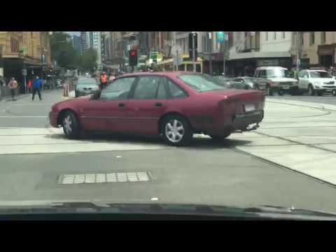 Extraordinary footage captures alleged Bourke St attacker driving recklessly on Flinders Street