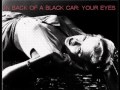 In Back Of A Black Car Your Eyes