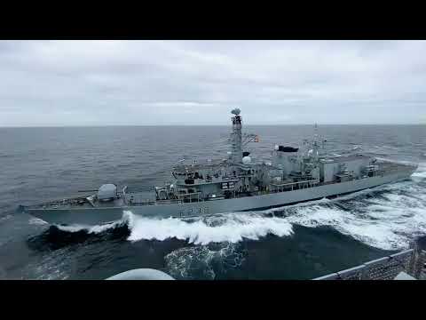 HMS Richmond prepares for replenishment at sea on her way to the US