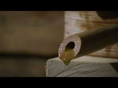Mauri Oil House making fresh organic cold-pressed oil with wooden oilpresses