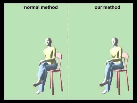 Lady sitting down and then standing up