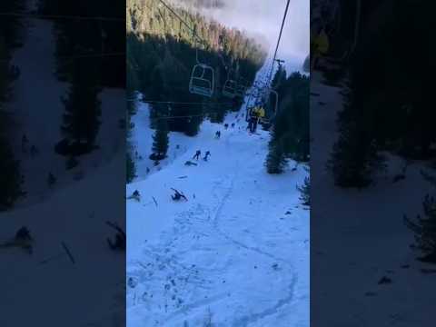 snowboarder falls, takes down the whole lift
