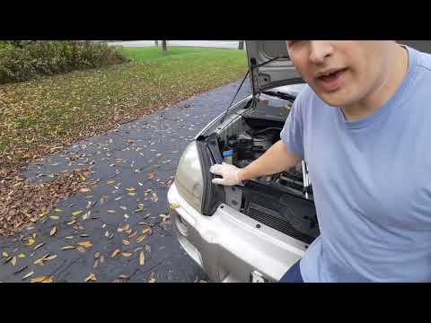 How to Replace a Head Light Bulb on a Hyundai Tucson (2005 - 2013)