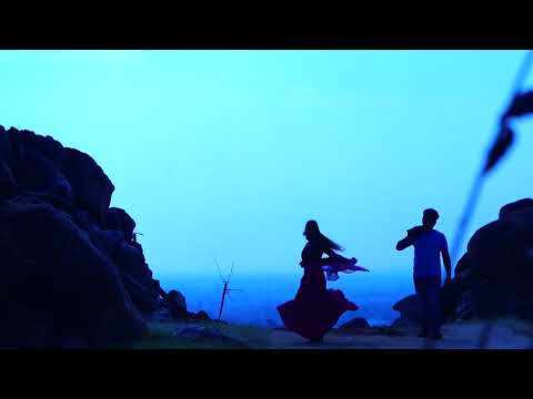 dancing couple on the beach slow motion