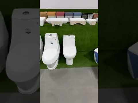 Floor mounted ceramic one piece toilet seat