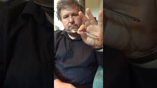 Spoon Bending Mindtrick - Using the power of my mind, this steel spoons bends. Just concentrate.
