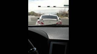 Hyundai Genesis pulled on by a Malibu?