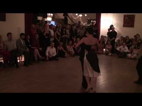  Adrian Costa  and  Amanda Costa  are  dancing  to  the  tango  "  Cascabelito  "