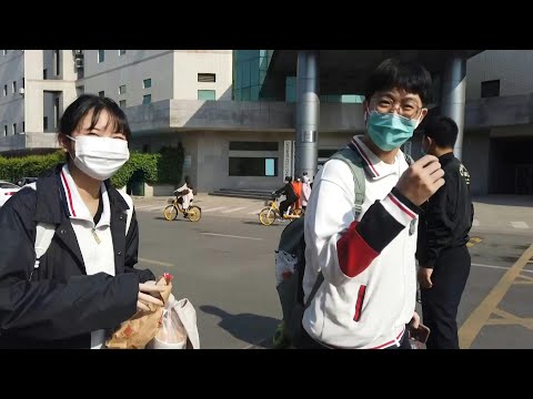 إعادة فتح المدارس الثانوية في الصين وسط التزام شديد باجراءات الوقاية | AFP